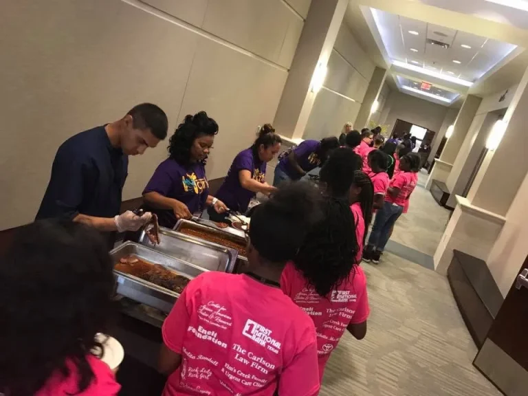 Girls taking their turn at an activity station