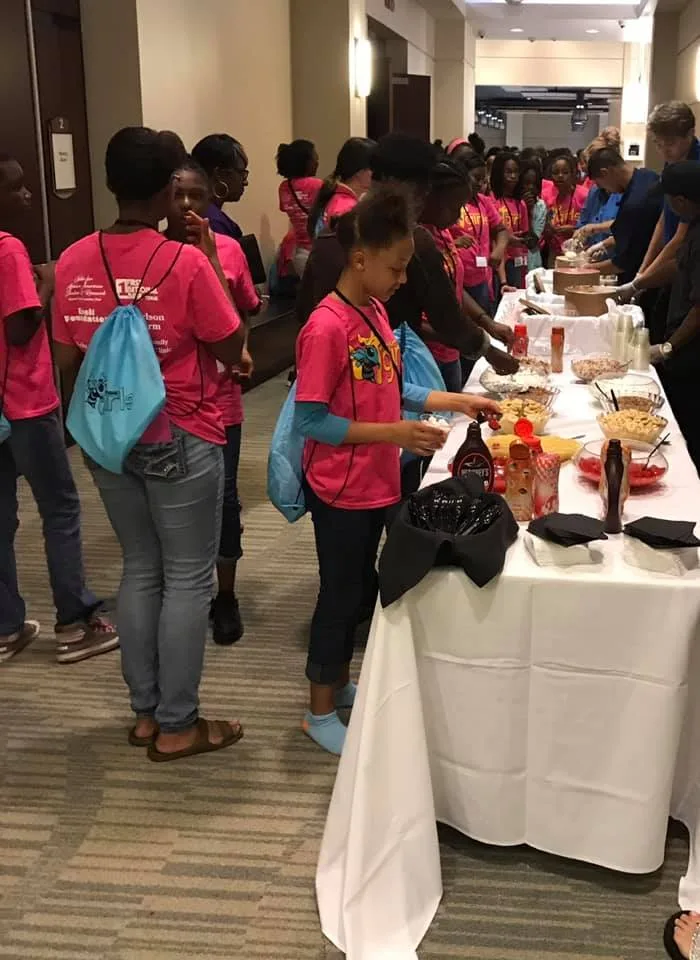 IT Girls participants working together on a group activity