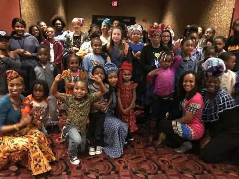Girls and families at a cultural celebration