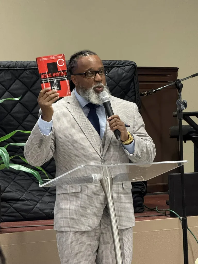 A guest speaker addresses the room