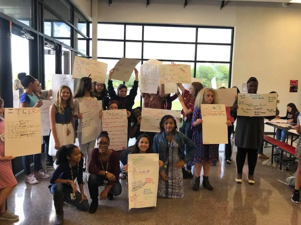 IT Girls participants presenting their project posters to the group