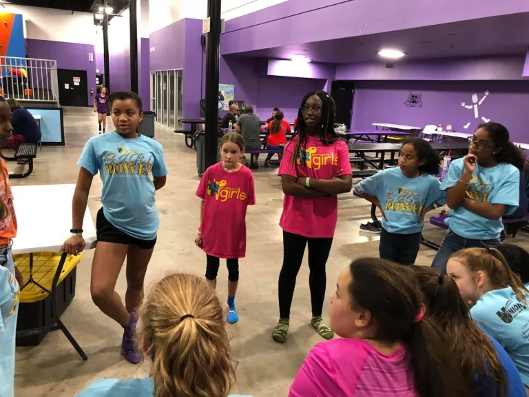 Girls gather before an activity at a group outing