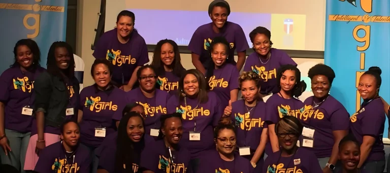 A group of girls in program shirts