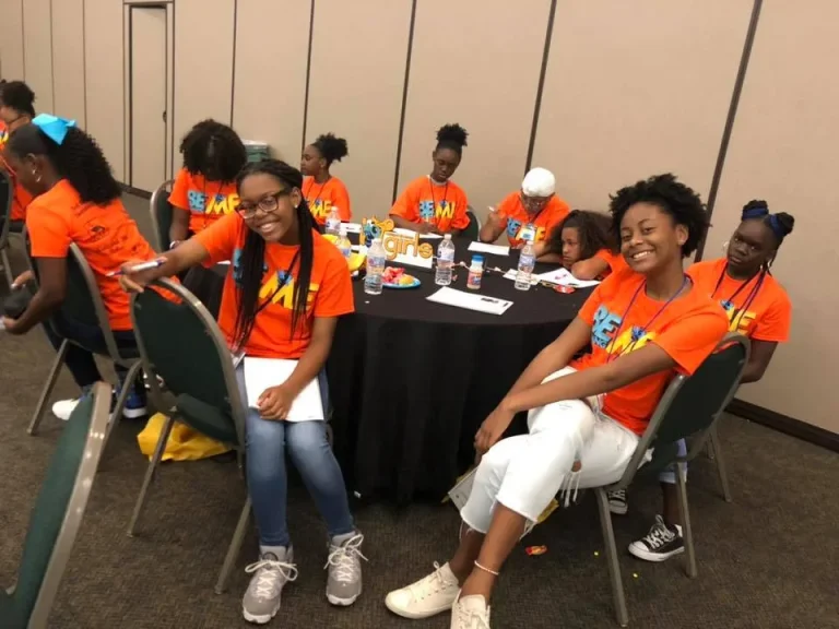 Girls talking at their table