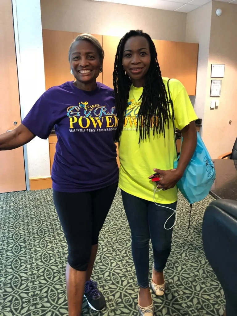 Two IT Girls volunteers on a workshop day